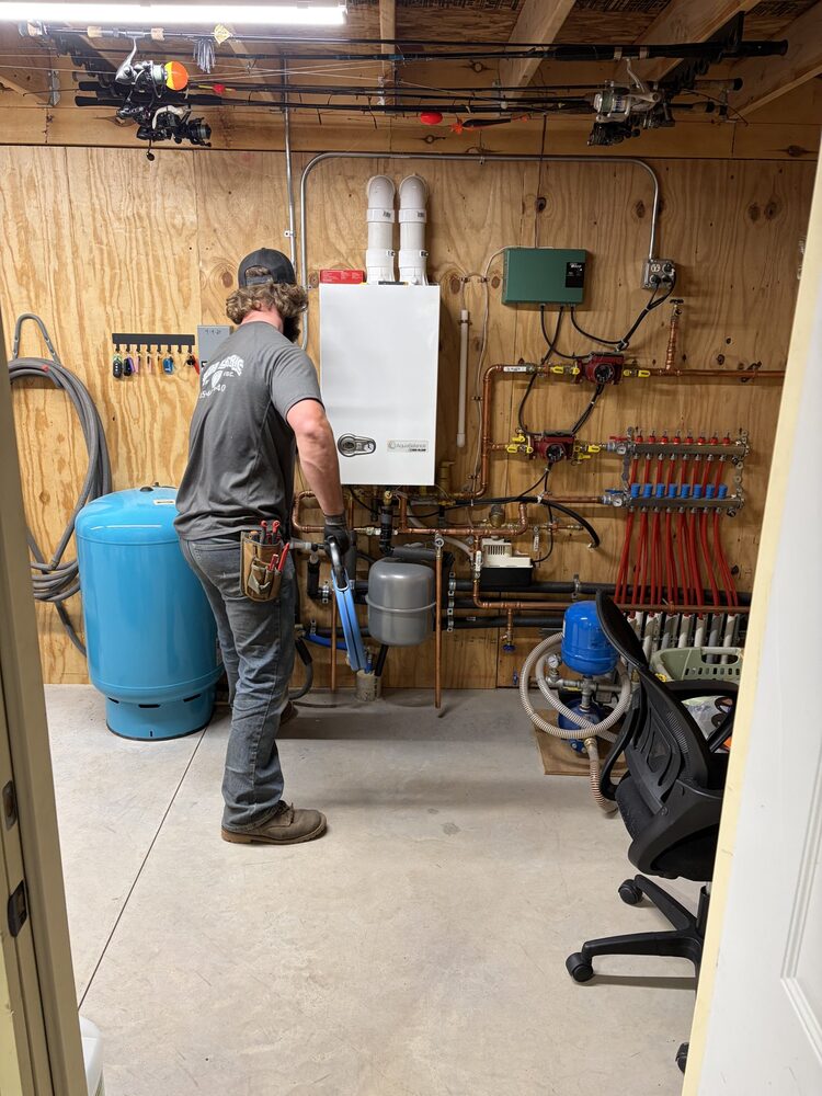 JETA Electric crew member working in a mechanical room