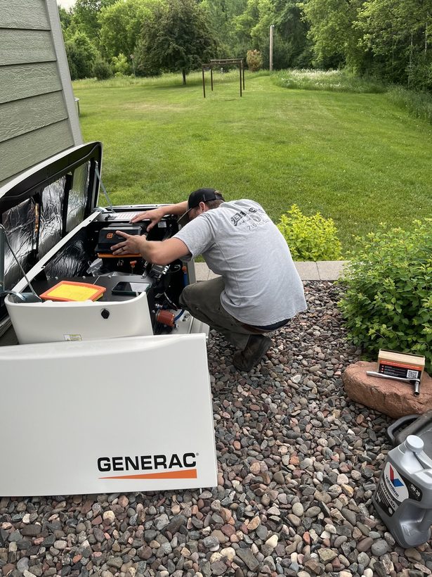 Authorized Generac dealer installing a home standby generator