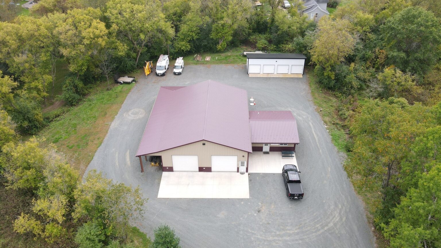 Aerial view of the JETA Electric shop, yard and service vans in Amery, Wisconsin
